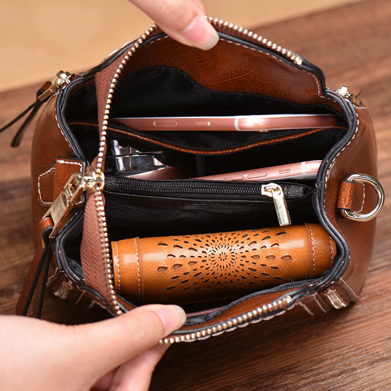 Cowhide women's bag Retro Crossbody bag that goes with anything Fashion bucket bag Genuine leather shoulder bag. Pochette