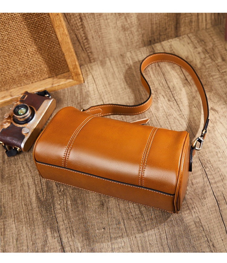 Ladies retro cowhide broadband cylindrical bag underarm bag simple temperament shoulder bag that goes with anything. Pochette