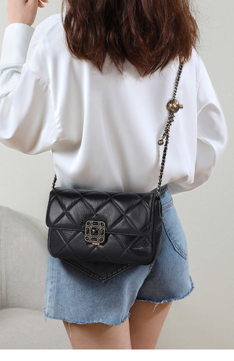 Women's bag Cowhide plaid chain bag Retro luxury fashion shoulder bag that goes with anything. Pochette