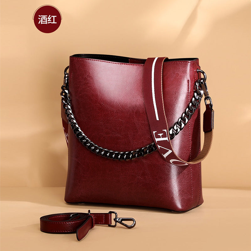 Women's Bag Genuine Leather Fashion Bucket Bag Handbag Personality Broadband Simple Shoulder Bag that goes with anything.Pochette