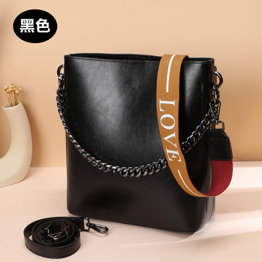 Women's Bag Genuine Leather Fashion Bucket Bag Handbag Personality Broadband Simple Shoulder Bag that goes with anything.Pochette