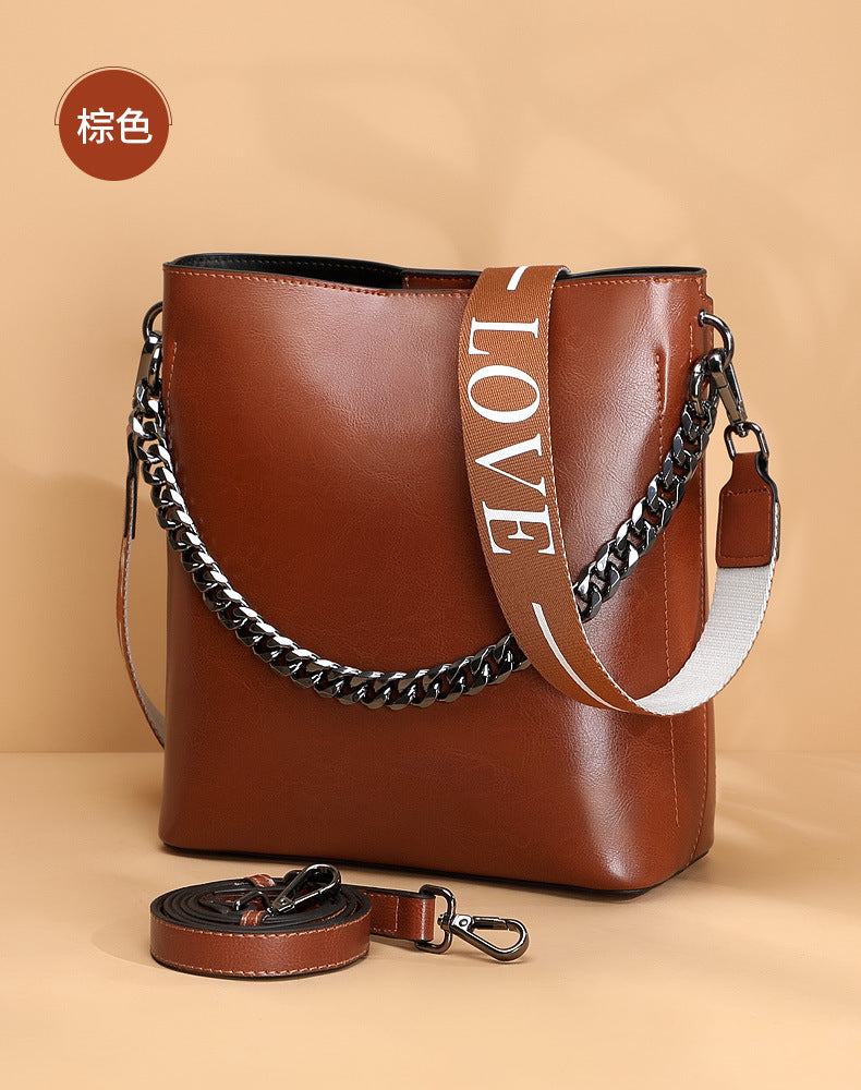 Women's Bag Genuine Leather Fashion Bucket Bag Handbag Personality Broadband Simple Shoulder Bag that goes with anything.Pochette
