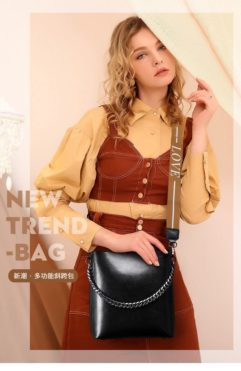 Women's Bag Genuine Leather Fashion Bucket Bag Handbag Personality Broadband Simple Shoulder Bag that goes with anything.Pochette