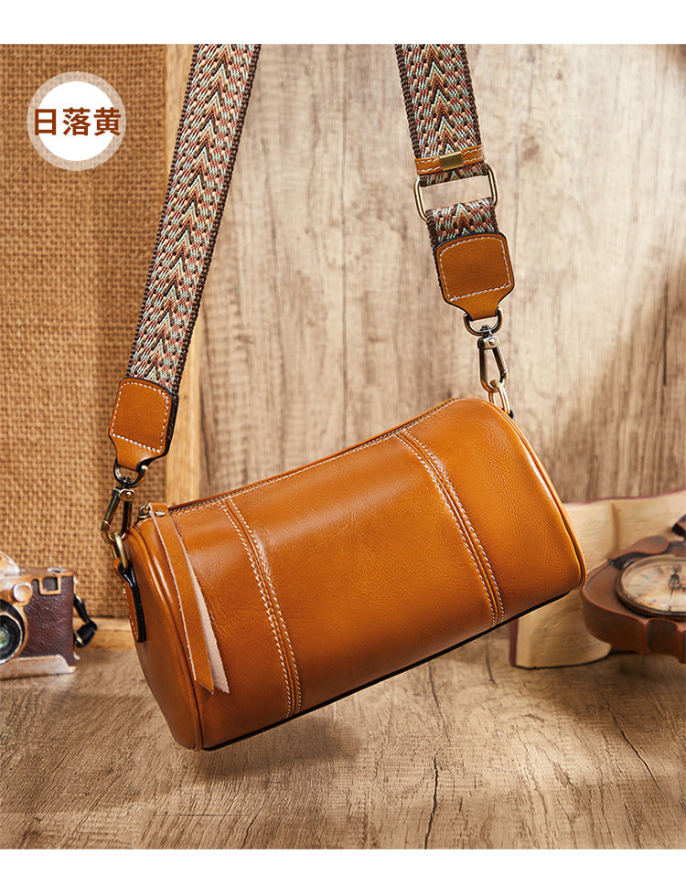 Ladies retro cowhide broadband cylindrical bag underarm bag simple temperament shoulder bag that goes with anything. Pochette