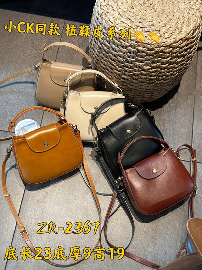 Cowhide bag Women's crossbody bag Casual genuine leather bucket bag Handbag Simple Shoulder bag that goes with anything. Pochette