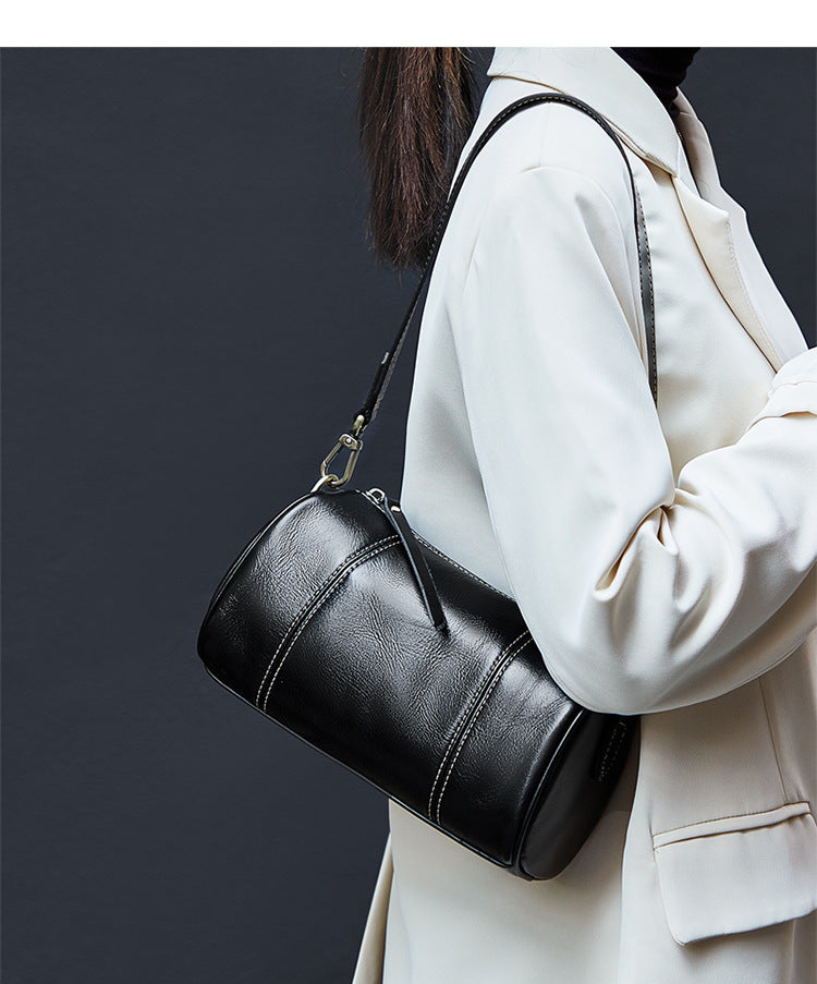 Ladies retro cowhide broadband cylindrical bag underarm bag simple temperament shoulder bag that goes with anything. Pochette