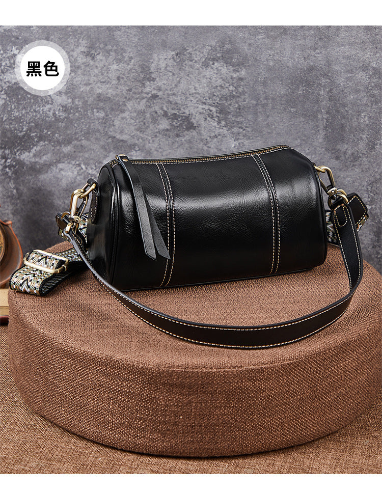 Ladies retro cowhide broadband cylindrical bag underarm bag simple temperament shoulder bag that goes with anything. Pochette