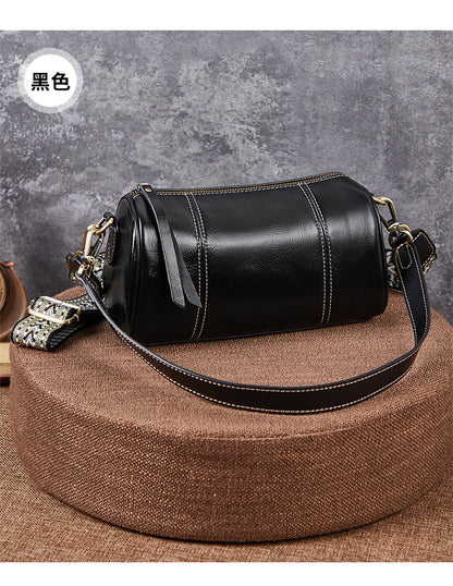 Ladies retro cowhide broadband cylindrical bag underarm bag simple temperament shoulder bag that goes with anything. Pochette