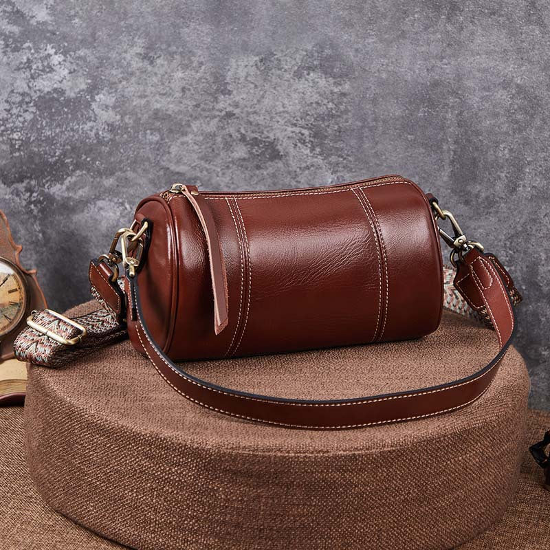 Ladies retro cowhide broadband cylindrical bag underarm bag simple temperament shoulder bag that goes with anything. Pochette