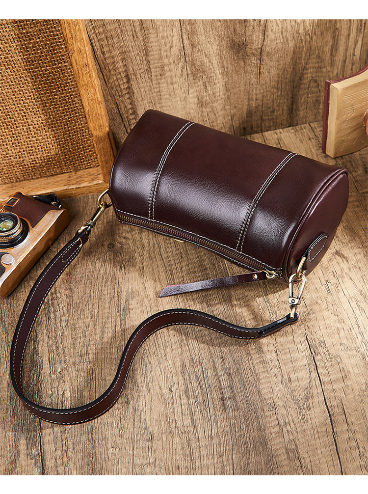 Ladies retro cowhide broadband cylindrical bag underarm bag simple temperament shoulder bag that goes with anything. Pochette