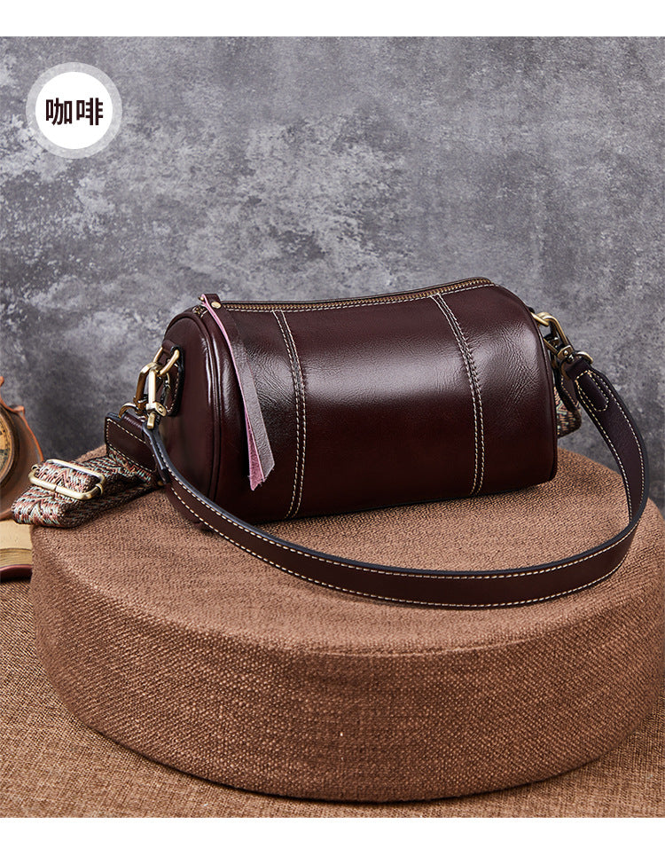 Ladies retro cowhide broadband cylindrical bag underarm bag simple temperament shoulder bag that goes with anything. Pochette